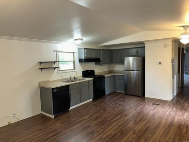 Cute little two bedroom mobile home sitting on .76 acres in - photo 8