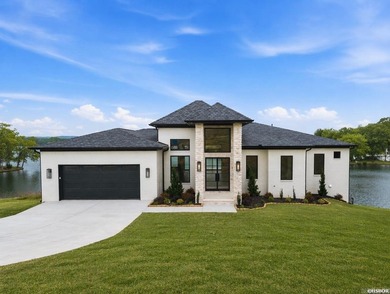 Experience luxury waterfront living in this custom new - photo 1