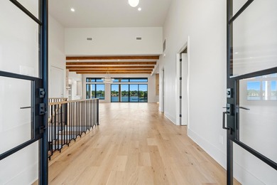Experience luxury waterfront living in this custom new - photo 3