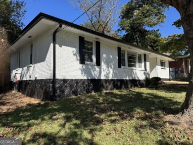 Lake Home For Sale in Forest Park, Georgia