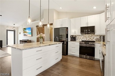 PRICE ADJUSTMENT! Welcome to this beautifully updated 3-bedroom - photo 3