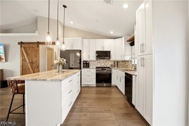 PRICE ADJUSTMENT! Welcome to this beautifully updated 3-bedroom - photo 6