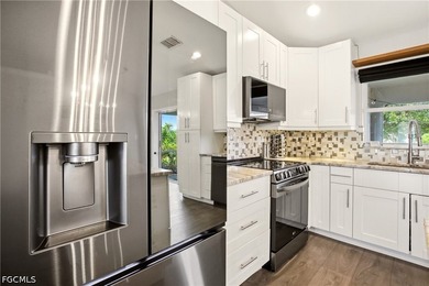 PRICE ADJUSTMENT! Welcome to this beautifully updated 3-bedroom - photo 7