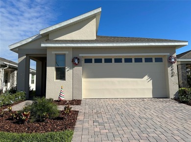 Welcome to this nearly new home located in the beautiful - photo 1