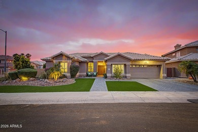 Beautifully maintained home on a coveted corner lot within a - photo 1