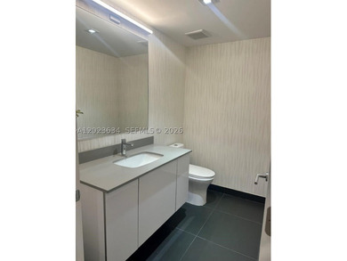 Stylish 1-bedroom + den, 1.5-bath residence at CANVAS Miami with - photo 4