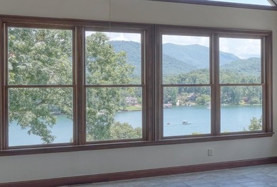 Elegant custom-built estate home with expansive lake views - photo 4