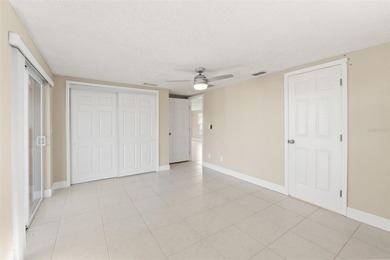 This beautifully updated Gulf Harbors waterfront home delivers