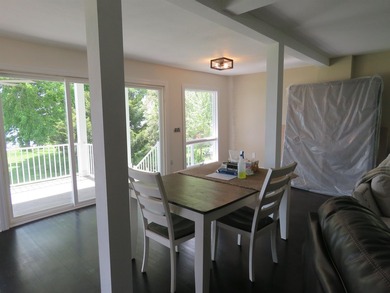 Beautifully remodeled 1 1/2 story home situated on 50 feet of - photo 6
