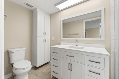 This beautifully updated Gulf Harbors waterfront home delivers