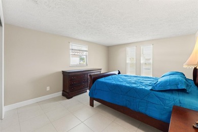 This beautifully updated Gulf Harbors waterfront home delivers