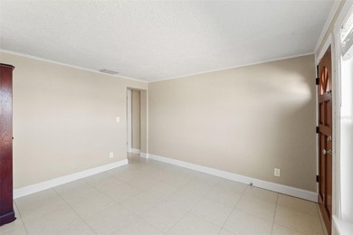 This beautifully updated Gulf Harbors waterfront home delivers