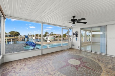 This beautifully updated Gulf Harbors waterfront home delivers