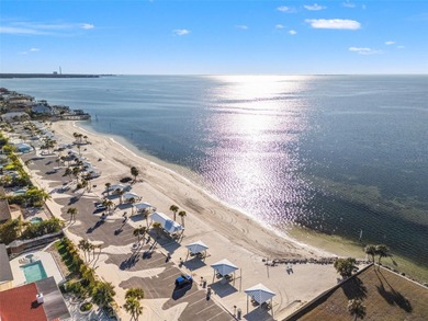 This beautifully updated Gulf Harbors waterfront home delivers