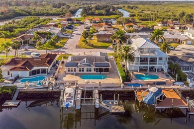 This beautifully updated Gulf Harbors waterfront home delivers
