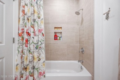 Experience refined coastal living in this lakeview end-unit - photo 22