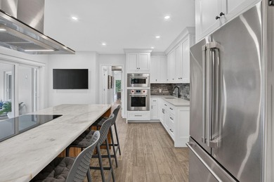 Exceptionally renovated and meticulously maintained, this - photo 27
