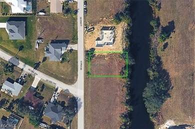 Build your dream home on this CANAL-FRONT lot in the rapidly - photo 2