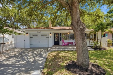 Coastal charm and exceptional curb appeal define this - photo 3