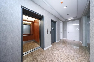 Luxury AND elegance Two-Family Home with Elevator, Rooftop, and - photo 35