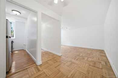 Welcome to this move-in-ready garden-level studio co-op at - photo 8