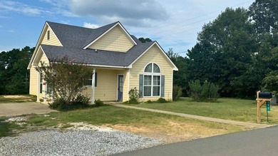 Discover comfort, convenience, and a touch of lake-life charm in - Lake Home For Sale in Zwolle, Louisiana