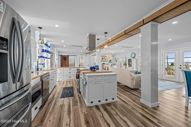 Welcome to an exceptional Neuse River retreat, just across the - photo 12
