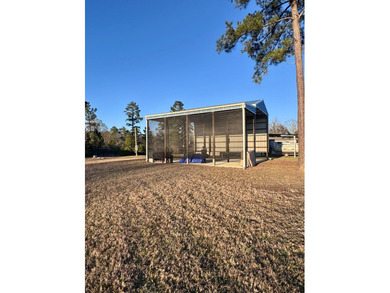 This versatile .47acre corner lot offers a readytouse RV cover - photo 2