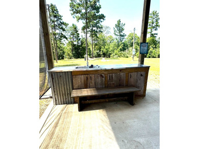 This versatile .47acre corner lot offers a readytouse RV cover - photo 3