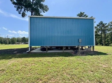 This versatile .47acre corner lot offers a readytouse RV cover - photo 4