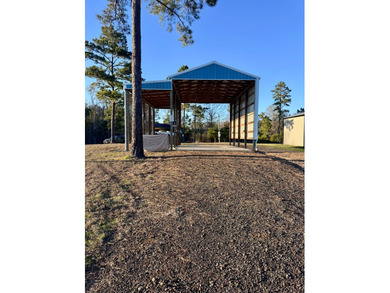 This versatile .47acre corner lot offers a readytouse RV cover - photo 6
