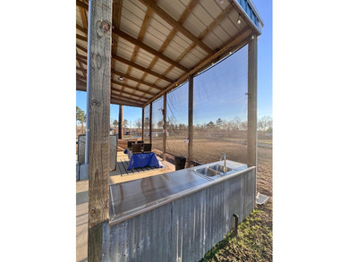 This versatile .47acre corner lot offers a readytouse RV cover - photo 7