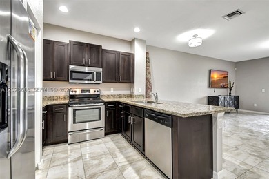 Newer construction townhome with serene water views. Gated - photo 8