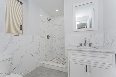 Welcome to this brand-new construction 7-over-7 two-family home - photo 18