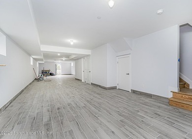 Welcome to this brand-new construction 7-over-7 two-family home - photo 22