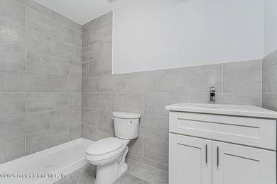 Welcome to this brand-new construction 7-over-7 two-family home - photo 24