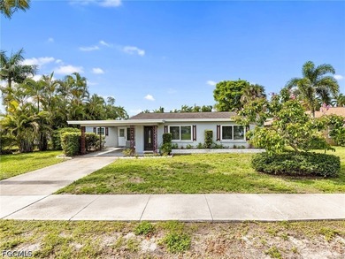 Don't miss this cozy two-bedroom mid-century gem nestled between - photo 1