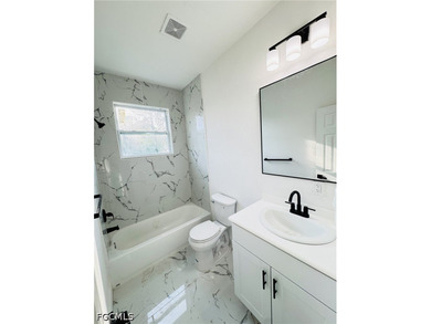 NEW HOME IN THE HEART OF LEHIGH ACRES! MOVE IN READY! GREAT - photo 3