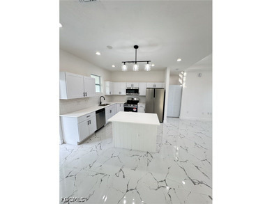NEW HOME IN THE HEART OF LEHIGH ACRES! MOVE IN READY! GREAT - photo 4