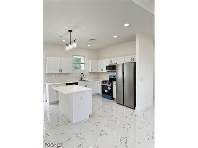 NEW HOME IN THE HEART OF LEHIGH ACRES! MOVE IN READY! GREAT - photo 5