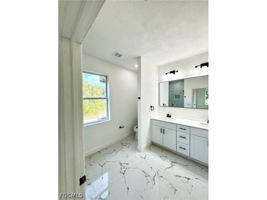 NEW HOME IN THE HEART OF LEHIGH ACRES! MOVE IN READY! GREAT - photo 6