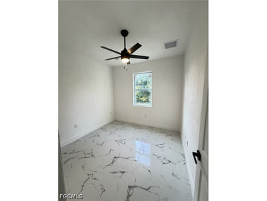 NEW HOME IN THE HEART OF LEHIGH ACRES! MOVE IN READY! GREAT - photo 8