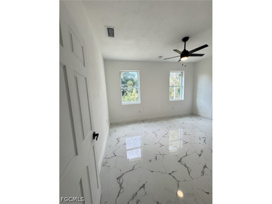 NEW HOME IN THE HEART OF LEHIGH ACRES! MOVE IN READY! GREAT - photo 10