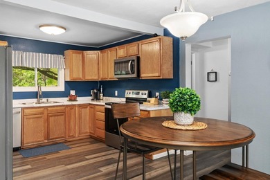 Tucked on a quiet street in Edgerton, this fully remodeled 2-bed - photo 3