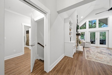 Built just three years ago, this stunning custom lakefront home - photo 8