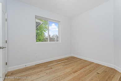 Welcome to this brand-new construction 7-over-7 two-family home - photo 14