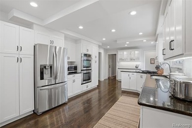 Welcome home to this stunning Bloomfield Hills ranch, where - photo 16