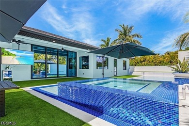 Elevated 2020 Custom Home with Resort-Style Outdoor Living in - photo 3