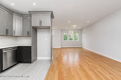Welcome to this brand-new construction 7-over-7 two-family home - photo 32