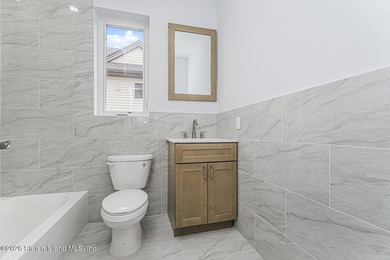 Welcome to this brand-new construction 7-over-7 two-family home - photo 33